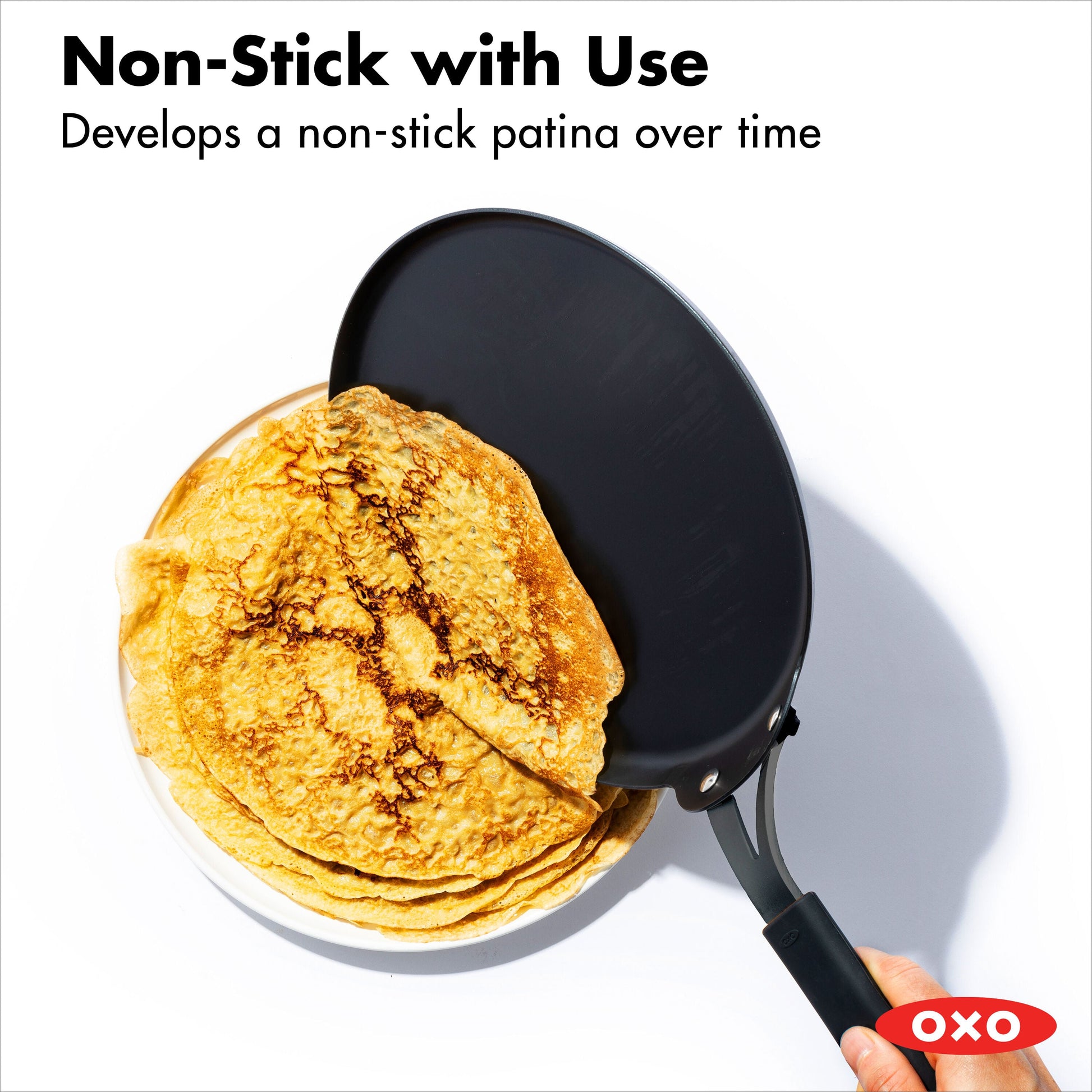 obsidian-carbon-steel-10-inch-crepe-pan-with-silicone-sleeve-x0 cc005102-001-4.jpg